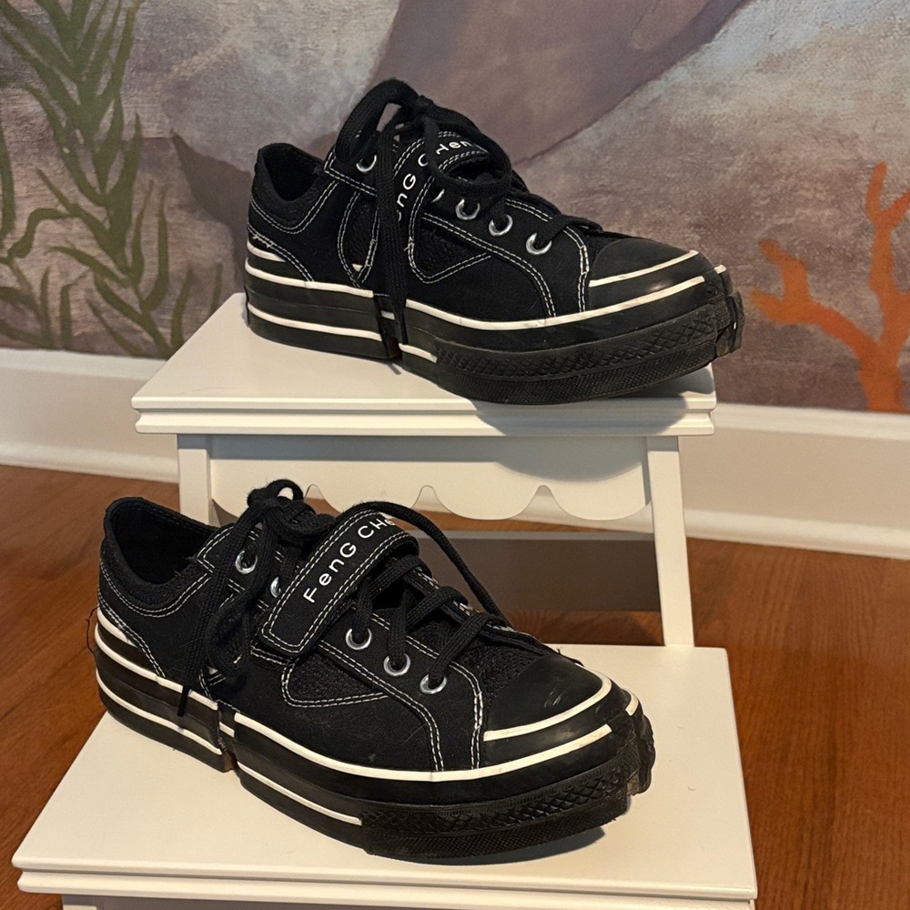 Converse x Feng Chen Wang black deconstructed shoes.